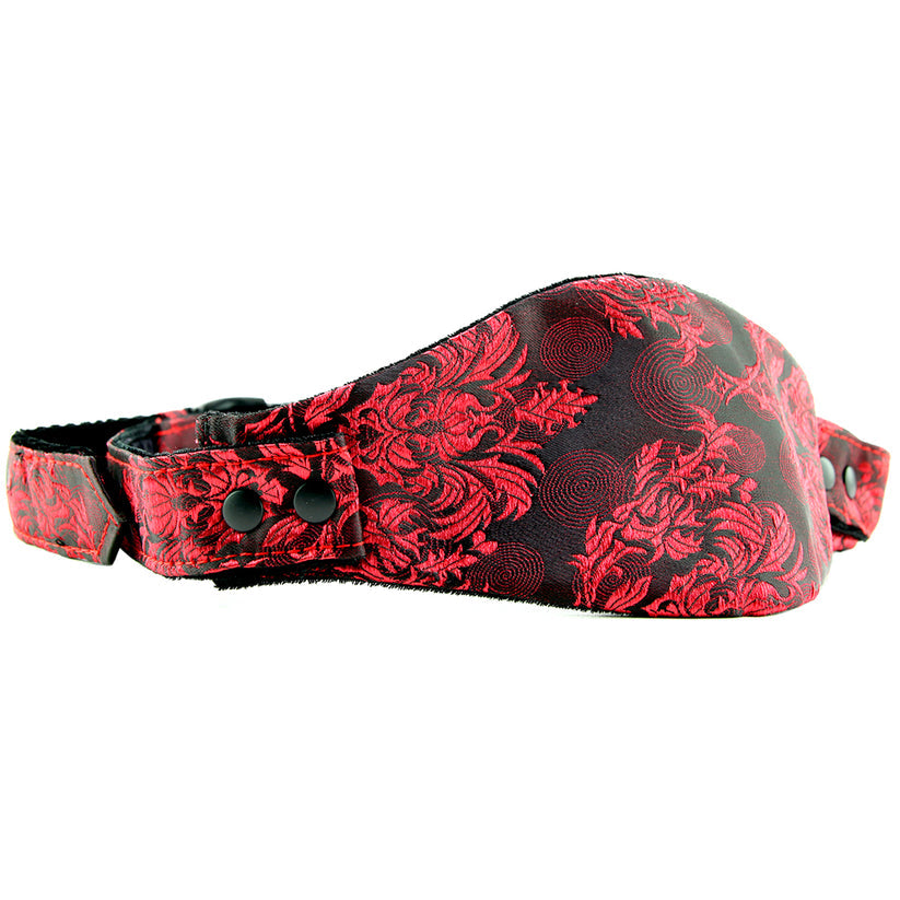 Absolutely beautiful, extra sexy, and perfect for playful mates with a little kink up their sleeves, the erotically inspirational Scandal line puts its signature lacy red print and creative design stamp on a favorite piece of play gear. Very effectively restraining the wearer - orally, at least! - the Hidden Pleasure Ball Gag silences sound and discourages spitting, biting and other various forms of oral disobedience.