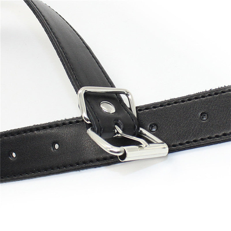 Open ring mouth gag with exposed metal ring and adjustable synthetic leather strap