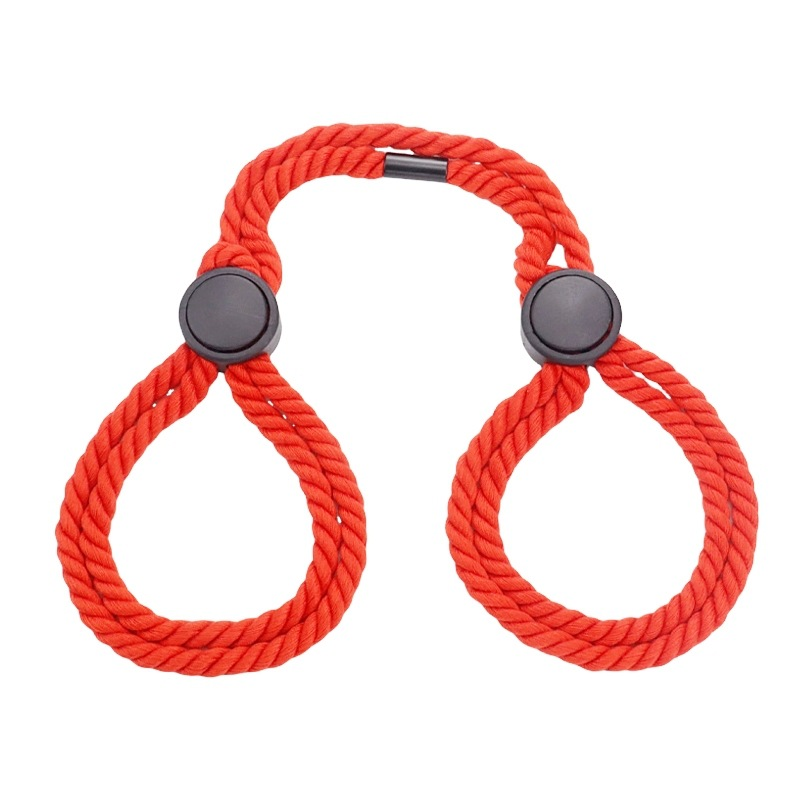Red adjustable rope handcuffs for BDSM play