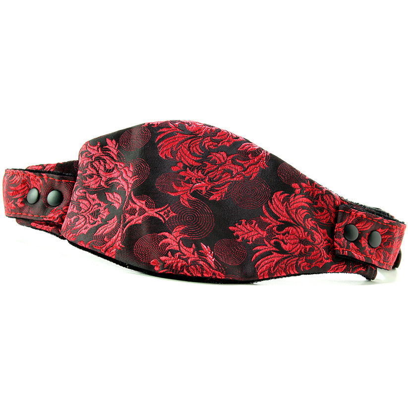 Absolutely beautiful, extra sexy, and perfect for playful mates with a little kink up their sleeves, the erotically inspirational Scandal line puts its signature lacy red print and creative design stamp on a favorite piece of play gear. Very effectively restraining the wearer - orally, at least! - the Hidden Pleasure Ball Gag silences sound and discourages spitting, biting and other various forms of oral disobedience.