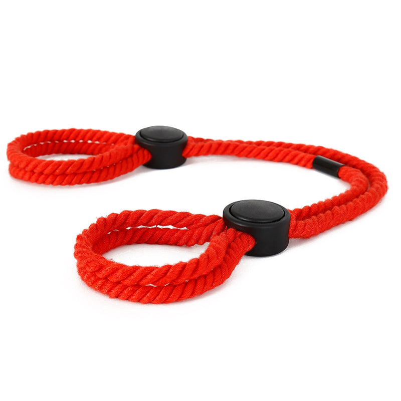 Red adjustable rope handcuffs for BDSM play
