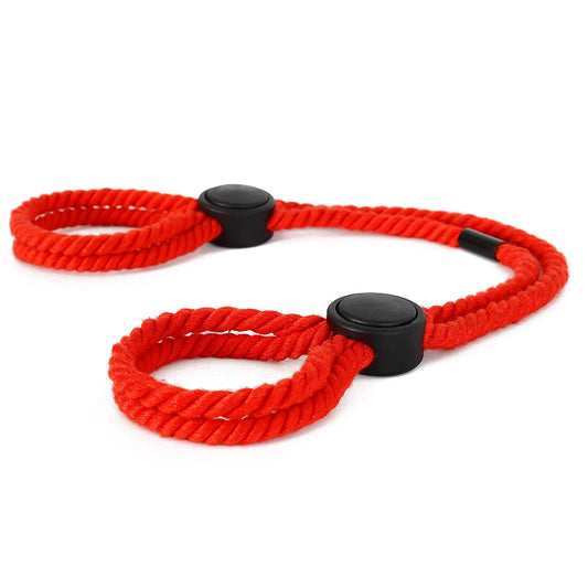 Red adjustable rope handcuffs for BDSM play