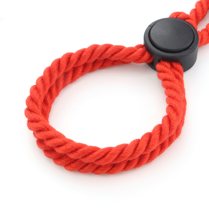 Red adjustable rope handcuffs for BDSM play