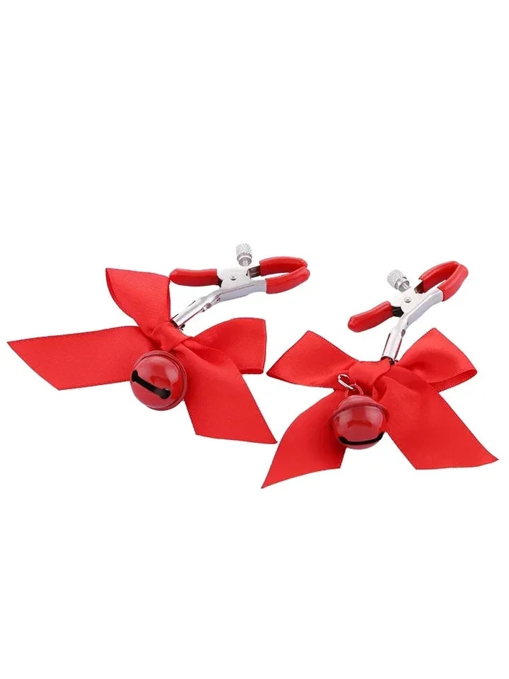Pretty metal clamps covered in rubber. The clamp has a screw that allows you to adjust its clamping power to your specific tastes. The end of each clip is decorated with a small satin bow and a matching colored bell.