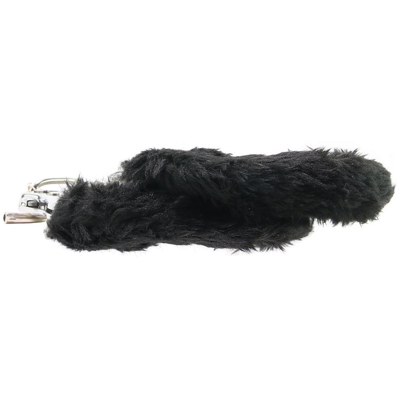 A beautiful set of classic cuffs suitable for all levels of rapturous bondage experience, the fur-lined cuffs, despite their soft, delicately fuzzy surface, are certainly sturdy and wonderfully escape-proof, setting the scene for literally hundreds of possible trussed-up fantasies.