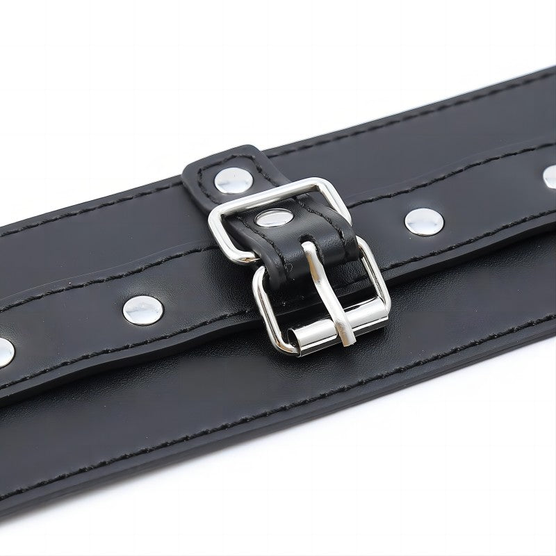 Black PU leather thumb restraint cuffs with metal hardware