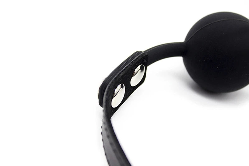 Black silicone ball gag with adjustable faux leather strap