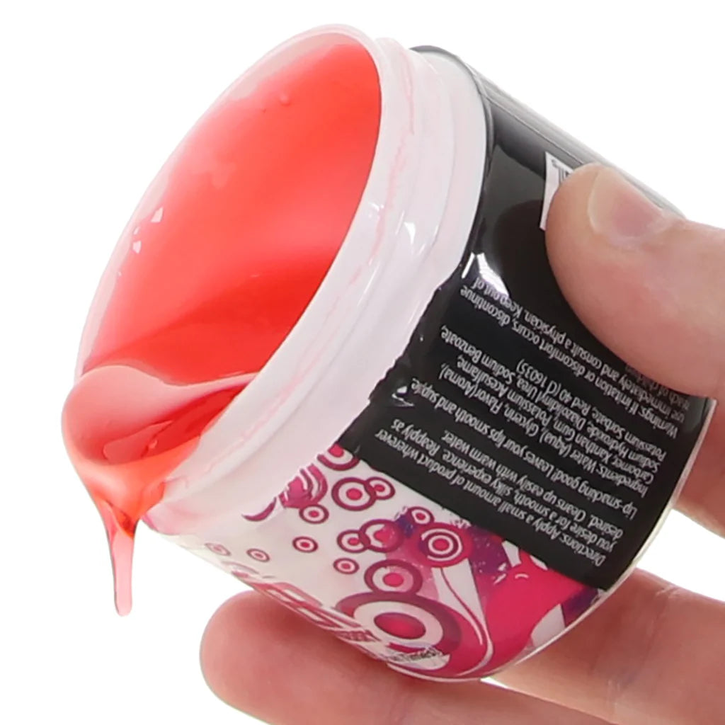 Container of strawberry flavored oral sex gel with silky texture designed for oral play, foreplay, and intimate couples use