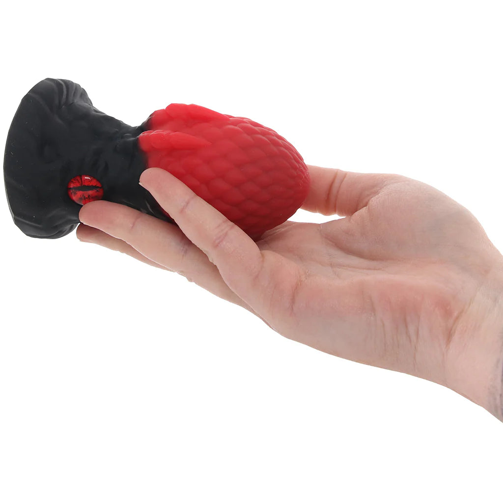 Creature Cocks Eye of the Dragon fantasy dragon egg butt plug with red scaled texture and dragon eye base