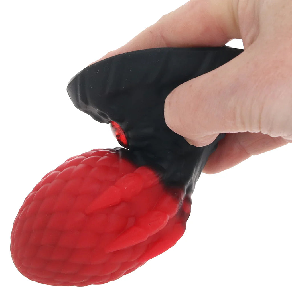 Creature Cocks Eye of the Dragon fantasy dragon egg butt plug with red scaled texture and dragon eye base