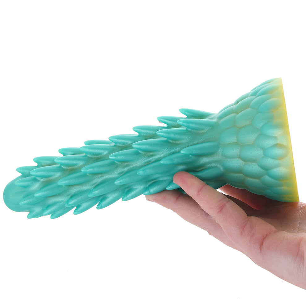 Creature Cocks Stegosaurus fantasy reptile dildo with soft spikes, scaled texture, and turquoise silicone design