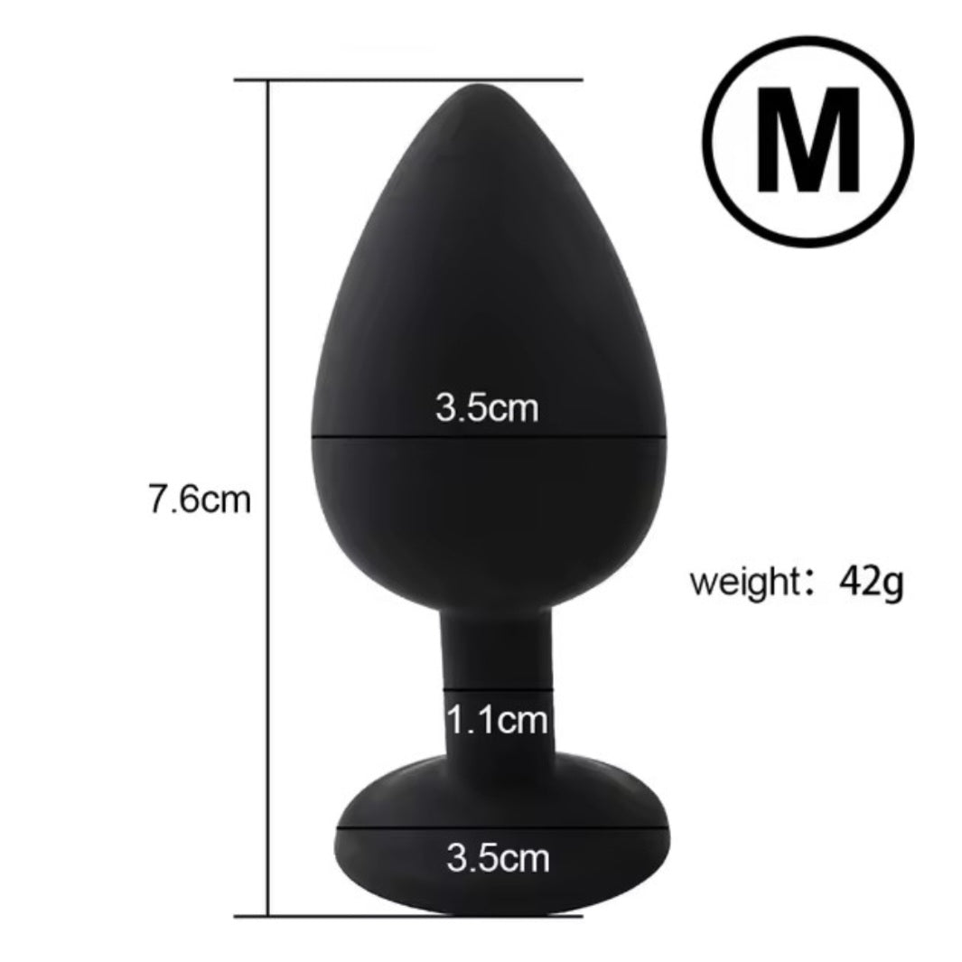 Medium silicone butt plug with silver gem in black