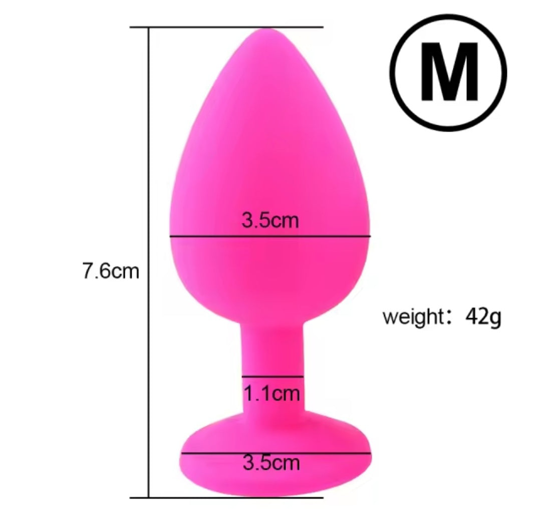 Medium silicone butt plug with silver gem in pink