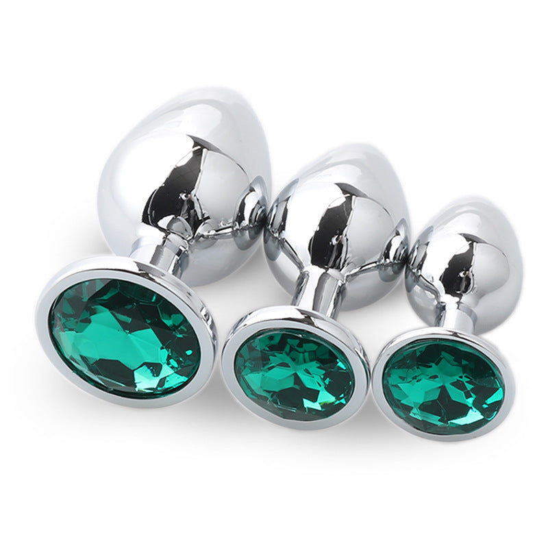 Metal anal plug set with three sizes and matching gem bases
