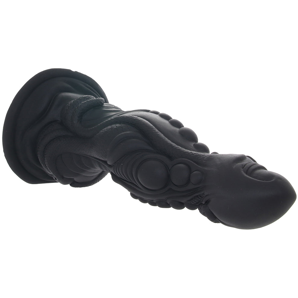 Monster Dong The Colossus fantasy creature dildo with black textured silicone shaft and suction cup base