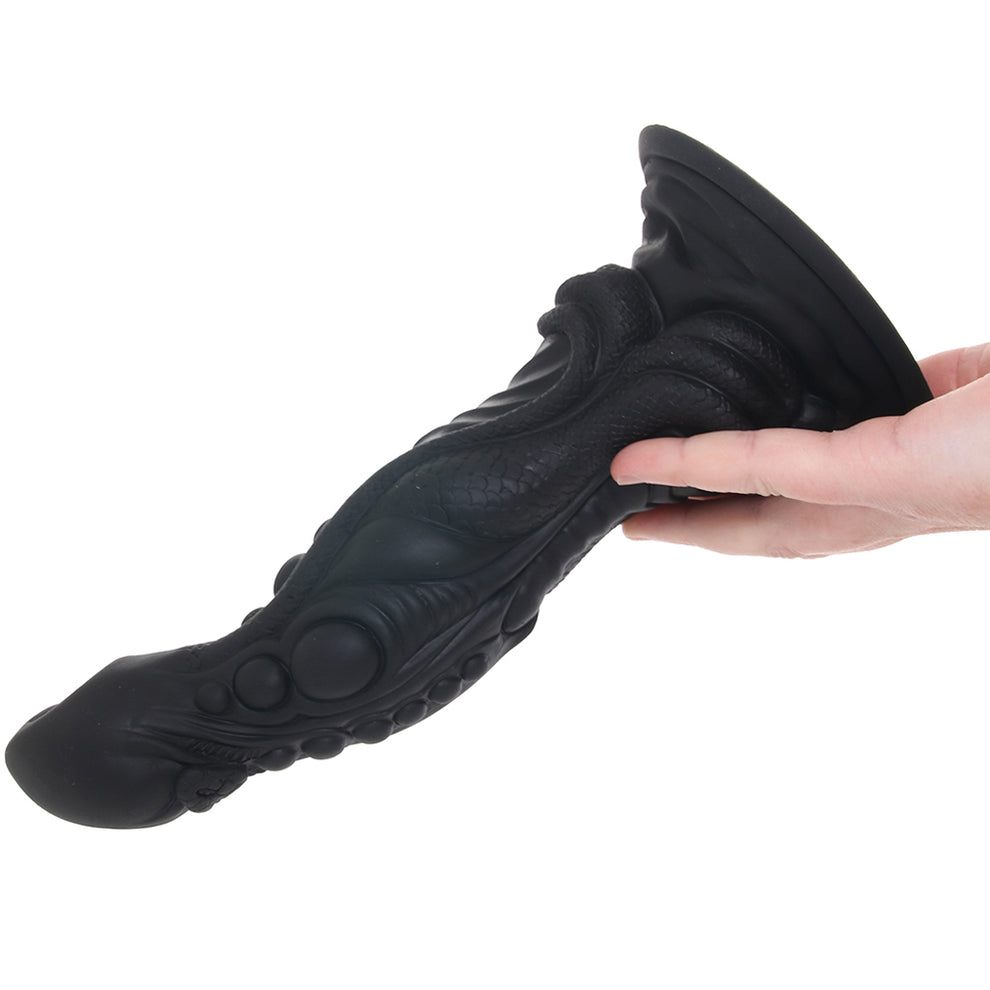 Monster Dong The Colossus fantasy creature dildo with black textured silicone shaft and suction cup base