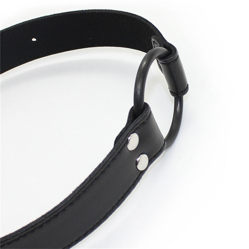 Open ring mouth gag with exposed metal ring and adjustable synthetic leather strap