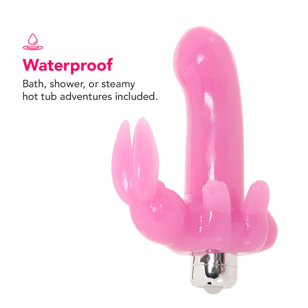 Pink Bunny Dreams rabbit vibrator with curved shaft and bunny-style clitoral stimulator for dual stimulation.