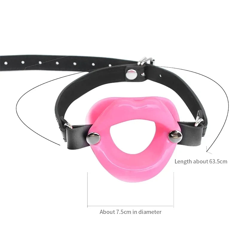 Combining soft faux leather leather with a tasteless silicone kiss. Uniquely styled, the soft Lips Gag holds the wearer's lips open, stifling sound and preventing biting, spitting and otherwise.