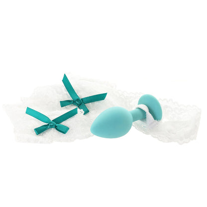 Featuring a silicone butt plug with soft white lace with peek-a-boo straps and pretty satin bows, it's not only beautiful, it's also super comfortable to wear.