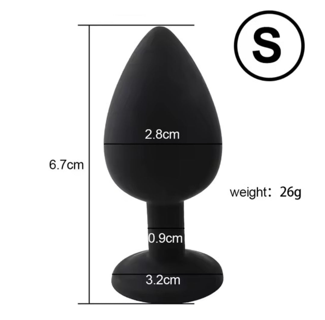 Small silicone butt plug with silver gem in black