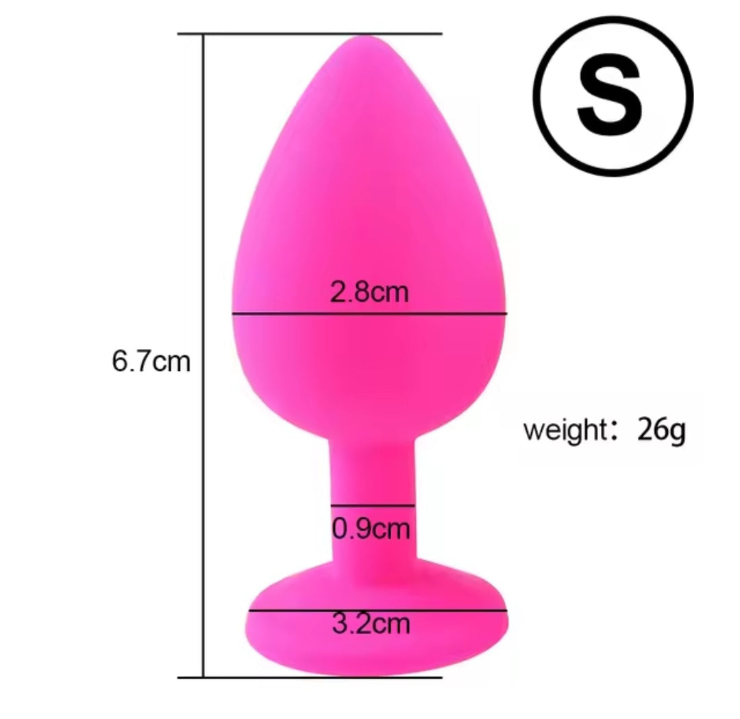 Small silicone butt plug with silver gem in pink